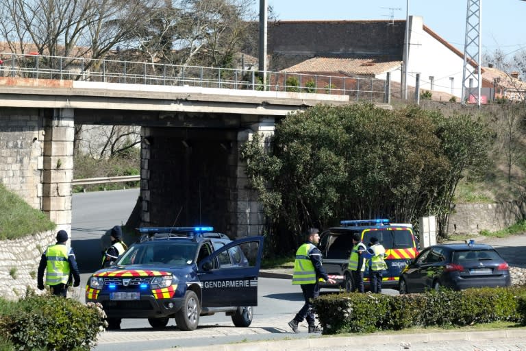 French gendarmes block access to the southwestern French town of Trebes, where a man took hostages in the latest in a string of atrocities in France since 2015