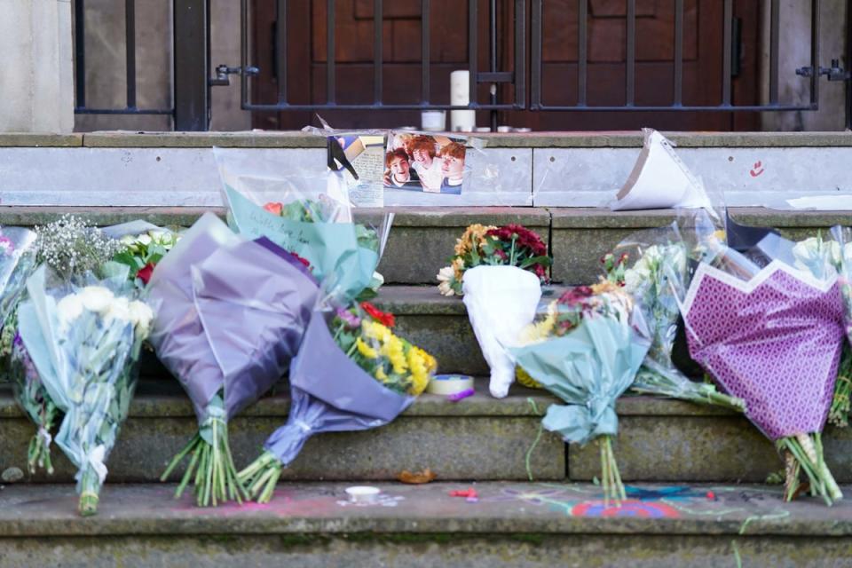 Tributes left on the steps at Shrewsbury College for Jevon Hirst, Harvey Owen, Wilf Fitchett and Hugo Morris, four teenagers who died in a car crash in Snowdonia, North Wales (PA)