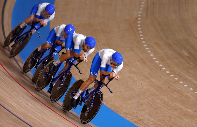 Italy's Simone Consonni, Italy's Filippo Ganna, Italy's Francesco Lamon and Italy's Jonathan Milan compete in the men's track cycling team pursuit qualifying event during the Tokyo 2020 Olympic Games at Izu Velodrome in Izu, Japan, on August 2, 2021. (Photo by Odd ANDERSEN / AFP) (Photo by ODD ANDERSEN/AFP via Getty Images) (Photo: ODD ANDERSEN via AFP via Getty Images)