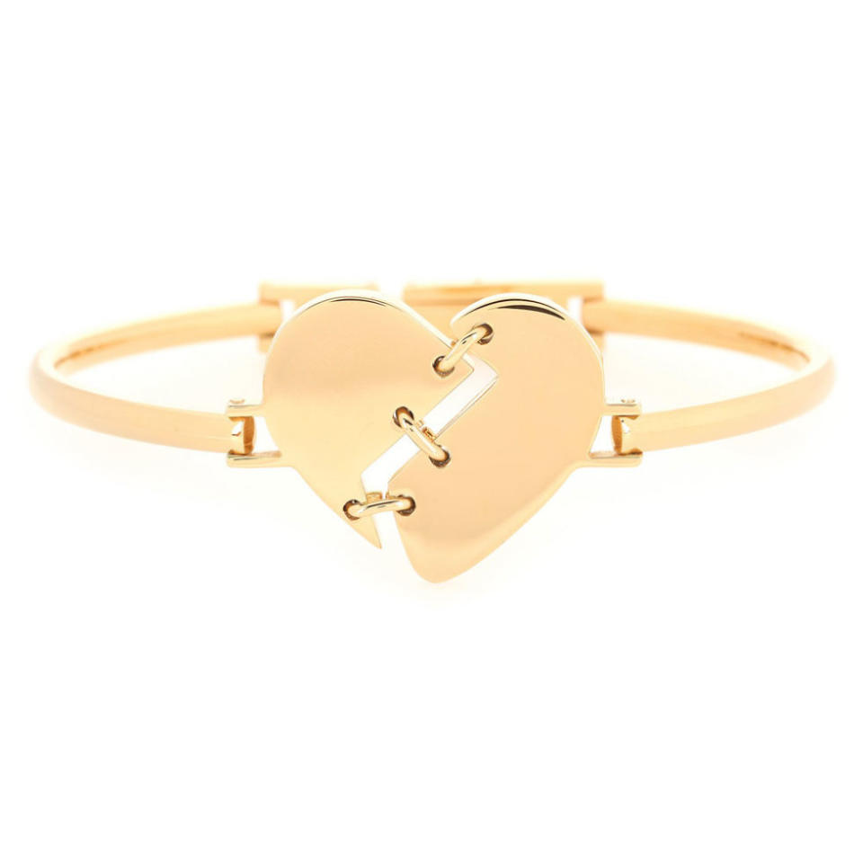 <p><a rel="nofollow noopener" href="http://www.mytheresa.com/en-us/broken-hearted-bracelet.html" target="_blank" data-ylk="slk:Broken Hearted Bracelet;elm:context_link;itc:0;sec:content-canvas" class="link "><i>Broken Hearted Bracelet</i></a><i>, MARC BY MARC JACOBS (Available at My Theresa), $82</i></p>