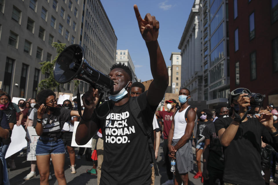 Demonstrators gather to protest the death of George Floyd, Wednesday, June 3, 2020, in Washington. Floyd died after being restrained by Minneapolis police officers. (AP Photo/Carolyn Kaster)