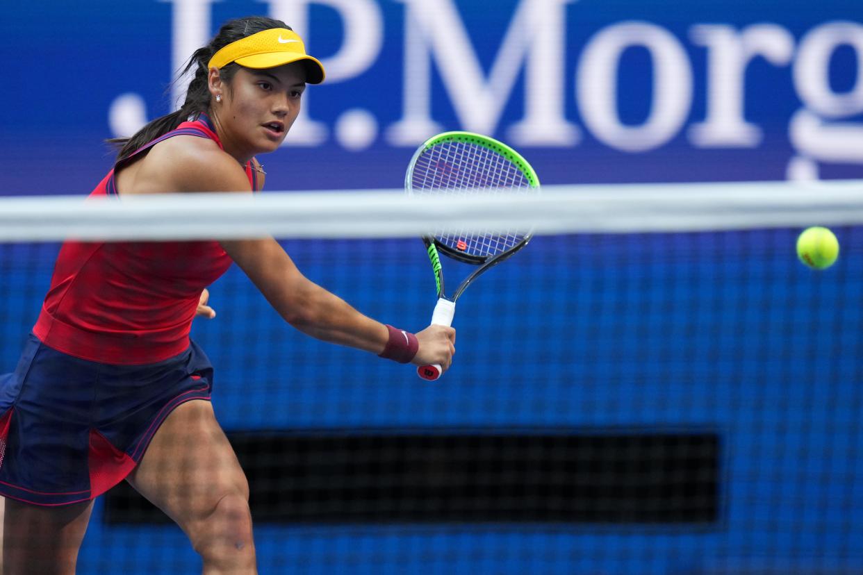 Sep 11, 2021; Flushing, NY, USA; Emma Raducanu of Great Britain hits a volley against Leylah Fernandez of Canada (not pictured) in the women's singles final on day thirteen of the 2021 U.S. Open tennis tournament at USTA Billie Jean King National Tennis Center. Mandatory Credit: Danielle Parhizkaran-USA TODAY Sports