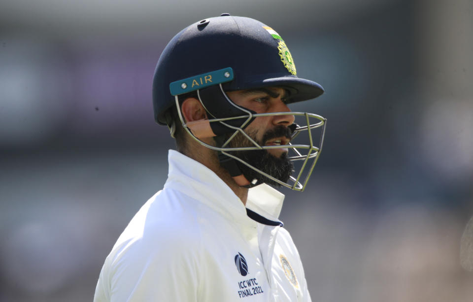 India's captain Virat Kohli walks off the field after losing his wicket during the sixth day of the World Test Championship final cricket match between New Zealand and India, at the Rose Bowl in Southampton, England, Wednesday, June 23, 2021. (AP Photo/Ian Walton)