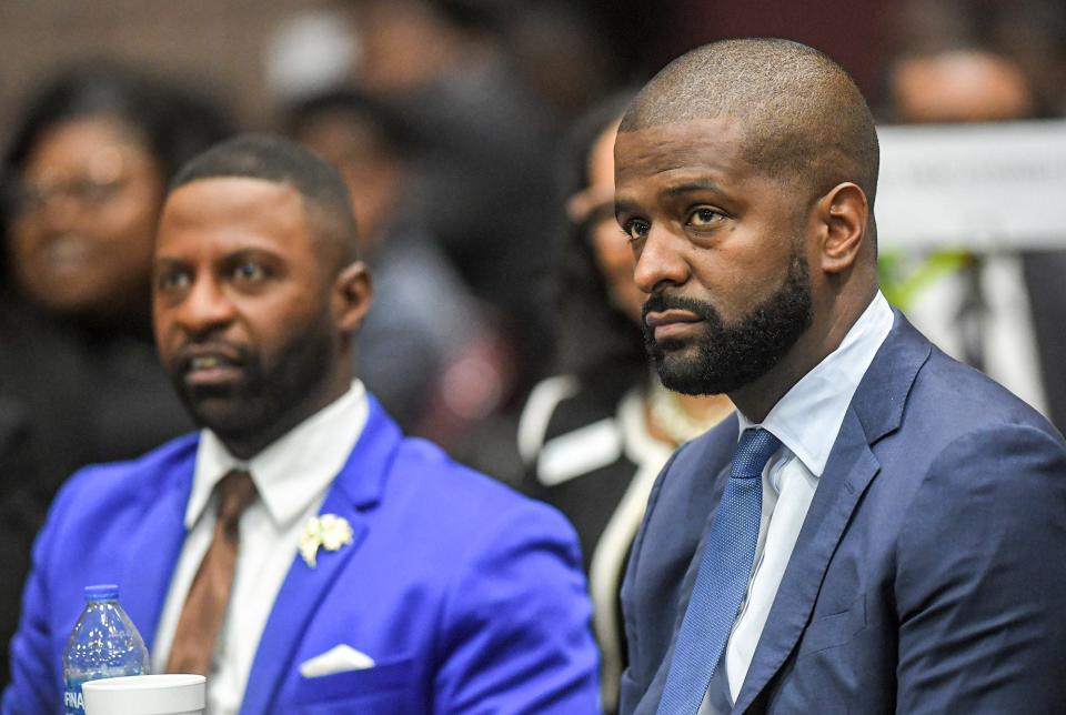 Former State Rep. Bakari Sellers, right, also a New York Times Bestselling author, civil rights activist, attorney and entrepreneur with WSPA television reporter Jamarcus Gaston listen to a speech during the 5th annual Tri-County Technical College Men of Color Luncheon at the Civic Center of Anderson, S.C. Thursday, November 2, 2023. Selllers spoke on stage about his life, aiming to educate, motivate, inspire, and empower the 200 area middle to high school students of color, and show them opportunities at Tri-County Technical College.