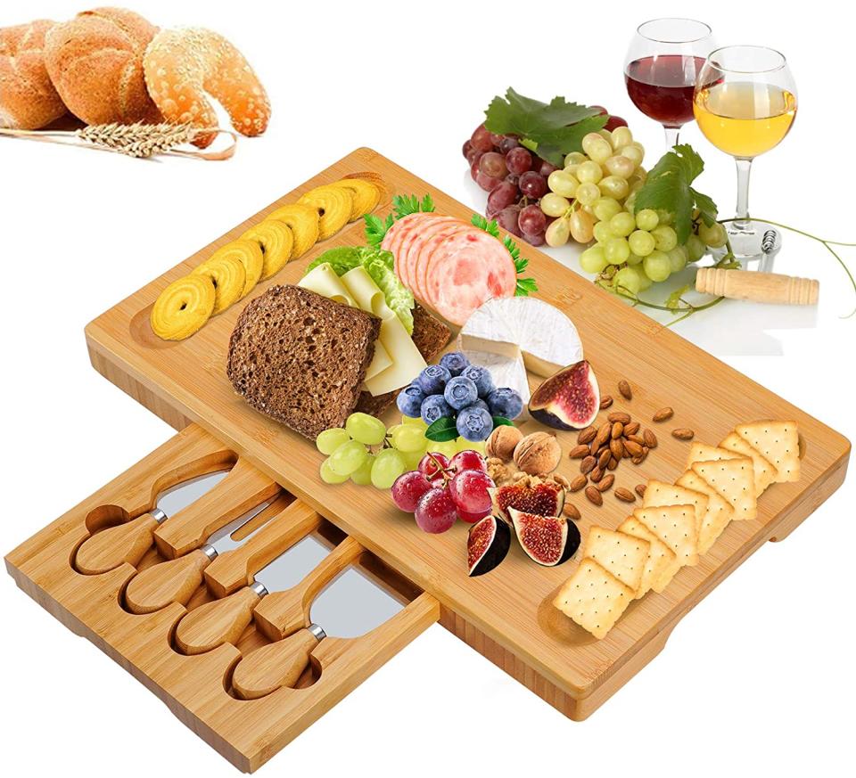 Bamboo Cheese Board Set with Drawer Wooden Charcuterie Tray Platter. Image via Amazon