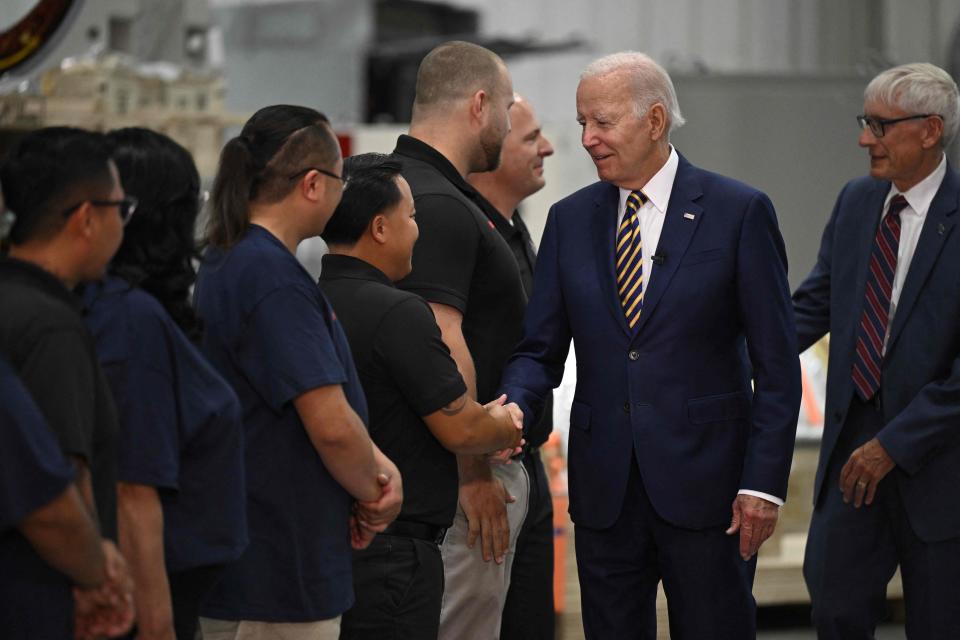 President Joe Biden greets employees at Ingeteam, Inc. in Milwaukee, Wisconsin, August 15, 2023.