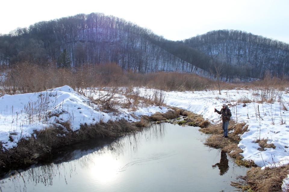 Bob Wagner of Viola casts for trout Jan. 14 on an outing on Elk Creek in Richland County during Wisconsin's early catch-and-release trout fishing season.