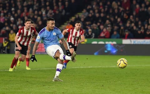 Manchester City's Brazilian striker Gabriel Jesus shoots from the penalty spot but has his shot saved during the English Premier League football match between Sheffield United and Manchester City at Bramall Lane - Credit: OLI SCARFF/AFP via Getty Images