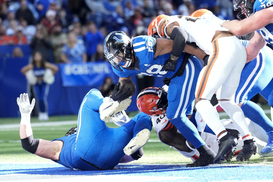 Indianapolis Colts running back Jonathan Taylor (28) scores on a 5-yard touchdown run during the second half of an NFL football game against the Cleveland Browns, Sunday, Oct. 22, 2023, in Indianapolis. (AP Photo/AJ Mast)
