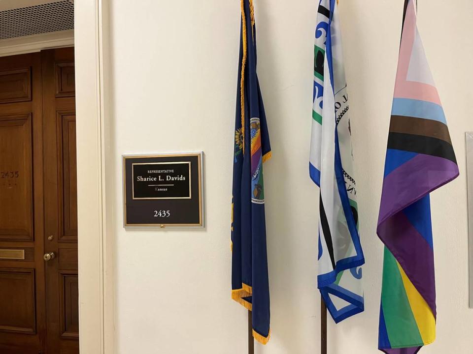 The door outside the office of Rep. Sharice Davids, a Kansas Democrat, had a pride flag, a flag of the Ho-Chunk Nation and a Kansas state flag on June 15, 2023. Davids is the first openly LGBTQ representative from Kansas and one of the first Native American women of Congress.