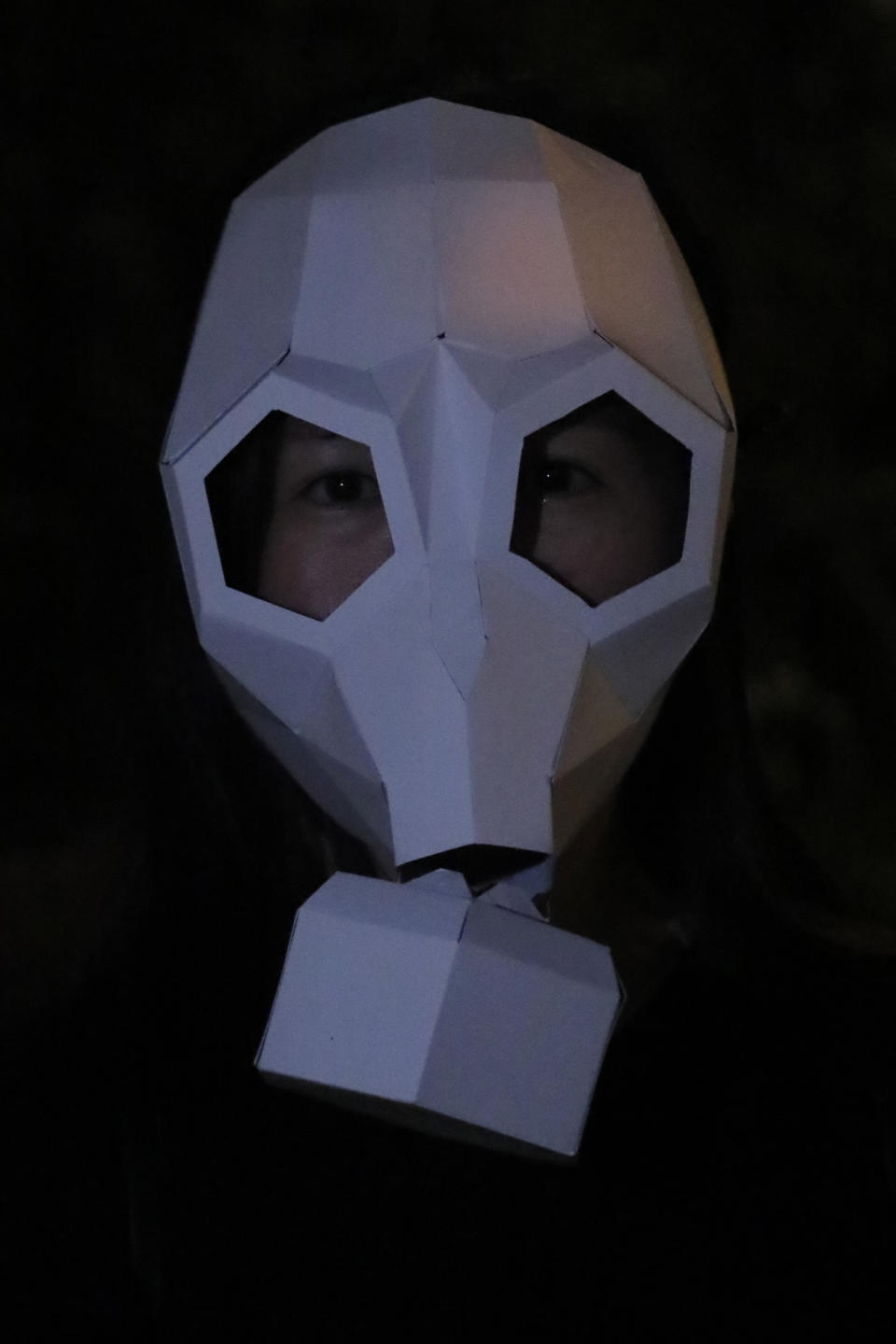 A protester wears a mask during a protest in Hong Kong, Friday, Oct. 18, 2019. Hong Kong protesters masqueraded as various characters in defiance of a government ban on face coverings at public gatherings. (AP Photo/Kin Cheung)