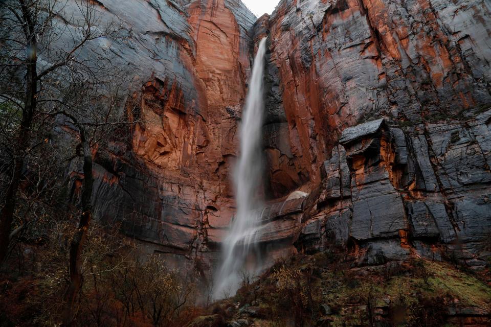 A waterfall runs through the rock in the Riverside Walk section of Zion Canyon in Zion National Park, Utah, on February 10, 2017.