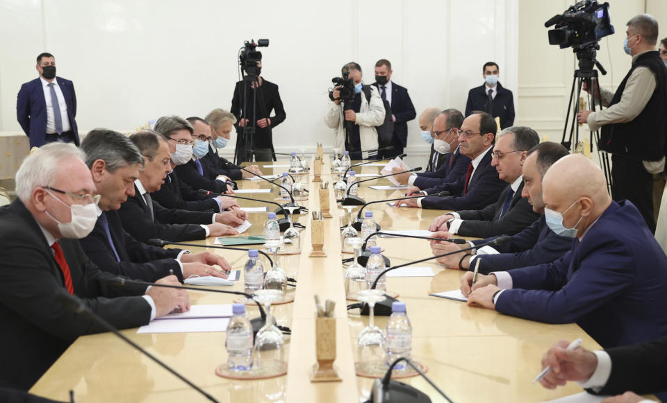FILE - In this Oct. 12, 2020, file photo released by Russian Foreign Ministry Press Service, Russian Foreign Minister Sergey Lavrov, third from left, meets with Armenia's Foreign Minister Zohrab Mnatsakanyan in Moscow, Russia. A Russian attempt to broker a cease-fire to end the worst outbreak of hostilities over the region of Nagorno-Karabakh in more than a quarter-century has failed to get any traction, with Azerbaijan and Armenia trading blame for new attacks. (Russian Foreign Ministry Press Service via AP, File)