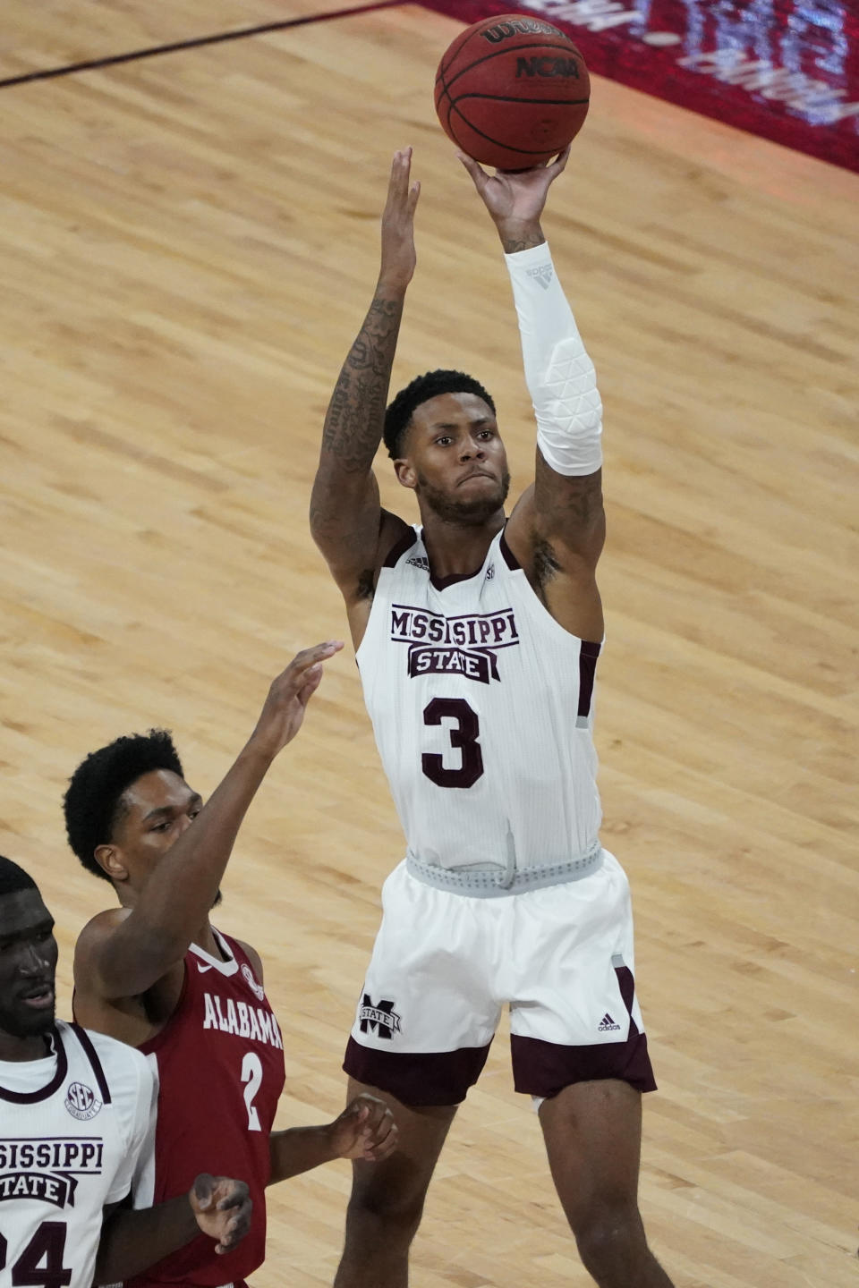 Mississippi State guard D.J. Stewart Jr. (3) shoots while Alabama forward Jordan Bruner (2) watches during the first half of an NCAA college basketball game in Starkville, Miss., Saturday, Feb. 27, 2021. (AP Photo/Rogelio V. Solis)