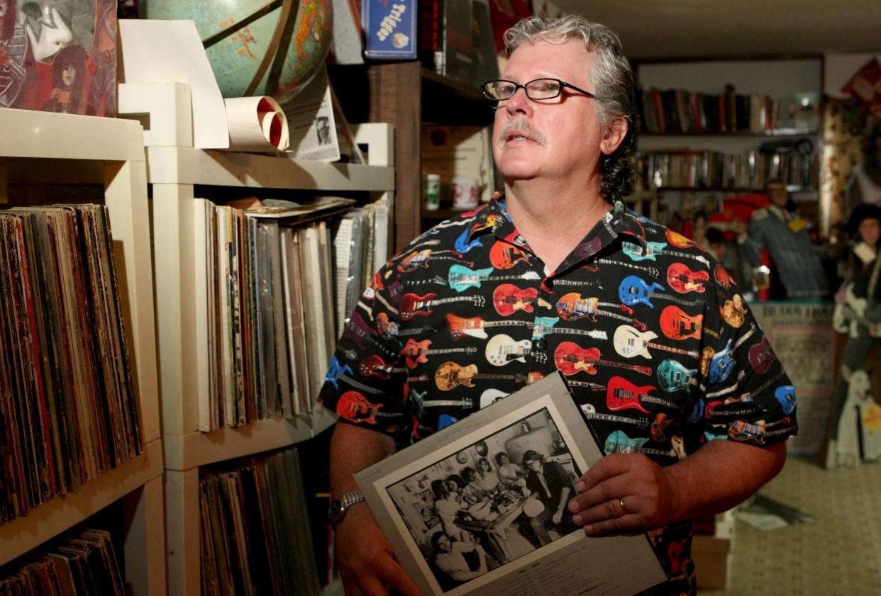 Ron Hall shows off some of his vinyl record collection on Aug. 8, 2008.