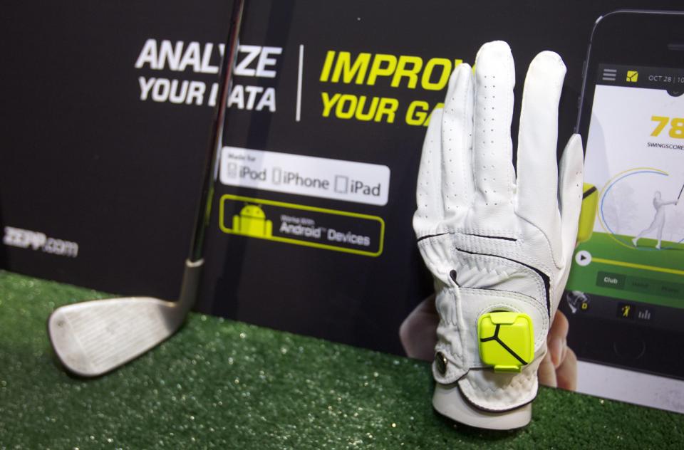 A Zepp sensor is shown on a golf glove during "CES Unveiled," a media preview event to the annual Consumer Electronics Show (CES), in Las Vegas, Nevada, January 5, 2014. The sensors, available for golf, baseball and tennis, analyze 1,000 data points per second to create 3D representations of a player's swing, a representative said. The sensors retail for $149.99, he said. (REUTERS/Steve Marcus)