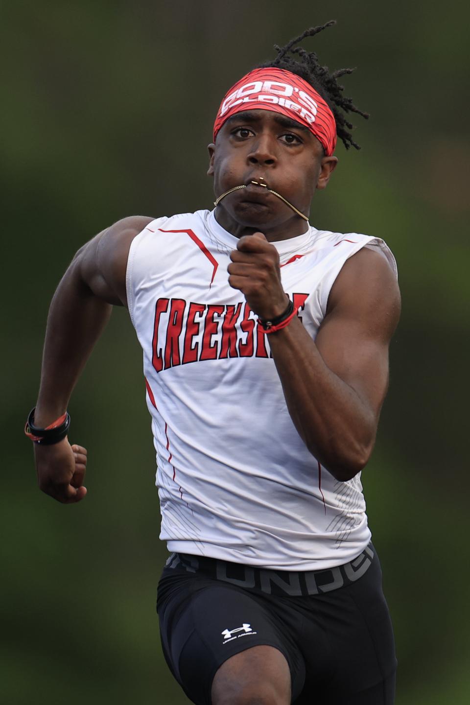 Christian Miller races to win the 100-meter dash at the District 2-4A track and field championship. The Creekside senior has run as fast as 10.06 at the distance.