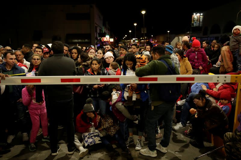 Migrants, mainly from Cuba, block the Paso del Norte border crossing bridge after a U.S. appeals court blocked the Migrant Protection Protocols (MPP) program, in Ciudad Juarez