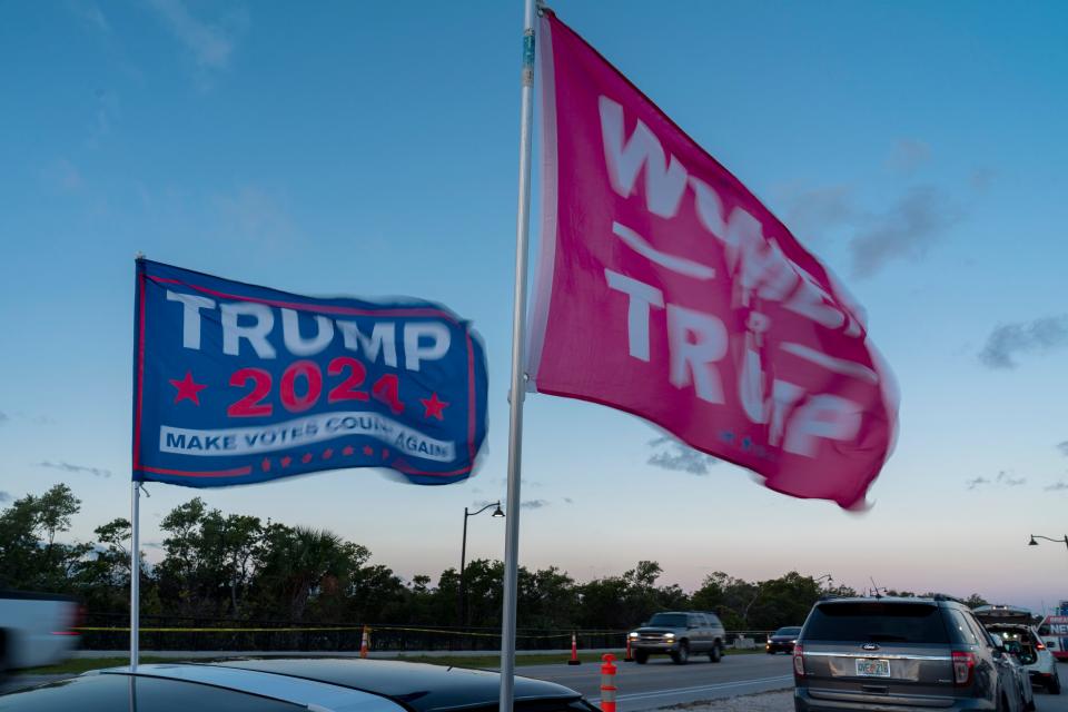 Flags fly near former president Donald Trump's Mar-A-Lago residence in Palm Beach, Florida on March 31, 2023. A New York grand jury voted to indict Trump over hush money payments made to porn star Stormy Daniels ahead of the 2016 election.