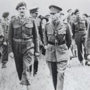 <p>Princess Elizabeth visits the military camp at Bulford in Wiltshire with King George VI (PA Archive) </p>