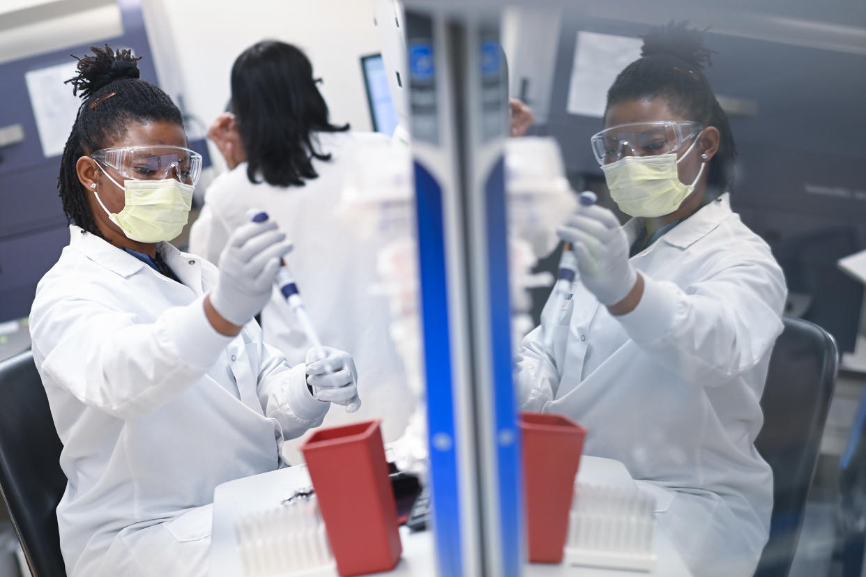 A person works in a lab at Novavax (Matt McClain / The Washington Post via Getty Images file)