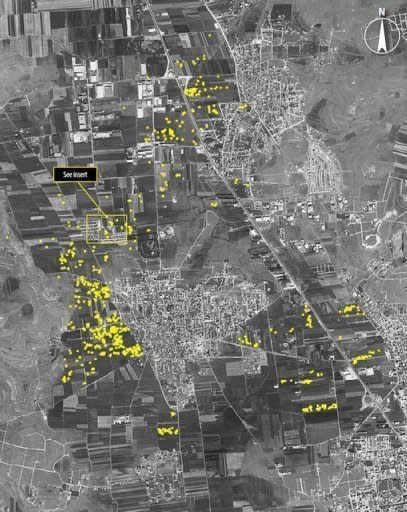 A handout satellite image shows what Amnesty International believes are 600 artillery impact craters from heavy fighting. Syria says its troops have seized a rebel-held Aleppo district after storming it and "annihilating" most of the insurgents, as a long-threatened ground assault on the key city was launched