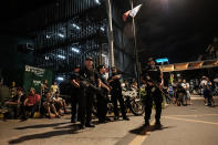 <p>Filipino policemen stand guard outside the Resorts World Manila building after gunshots and explosions were heard in Pasay City on June 2, 2017 in Manila, Philippines. (Photo: Basilio H. Sepe/Getty Images) </p>