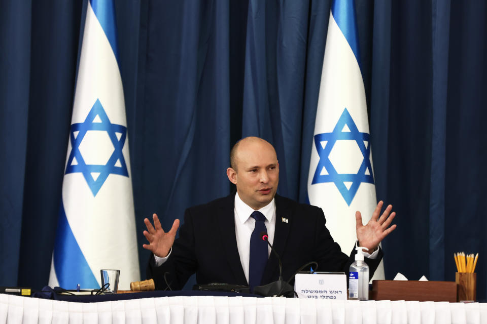 Israeli Prime Minister Naftali Bennett speaks at the weekly cabinet meeting at the Foreign Ministry in Jerusalem, Sunday, Aug. 8, 2021. (Ronen Zvulun/Pool via AP)