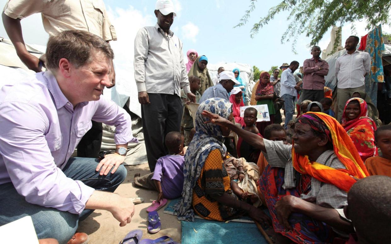 Justin Forsyth in the Hodan district of Somalia's capital Mogadishu in 2012 - REUTERS