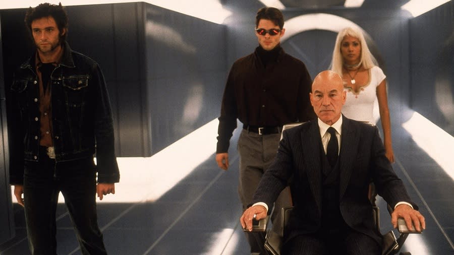 A still from the 2000 X-Men movie shows Charles Xavier, Storm, Cyclops, and Wolverine outside of Cerebro