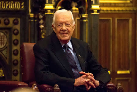 FILE PHOTO - Former U.S. President Jimmy Carter sits after delivering a lecture at the House of Lords in London, Britain February 3, 2016. REUTERS/Neil Hall/File Photo