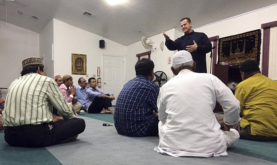 Sheriff's Deputy Nezar Hamze teaches members of the Baitul Mukarram Mosque in Lake Worth, Florida, how to defend themselves if a shooter attacks their worship service. (ASSOCIATED PRESS)