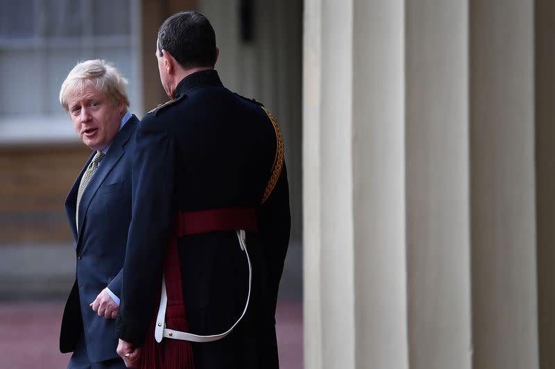 Britain's Prime Minister Boris Johnson leaves London's Buckingham Palace