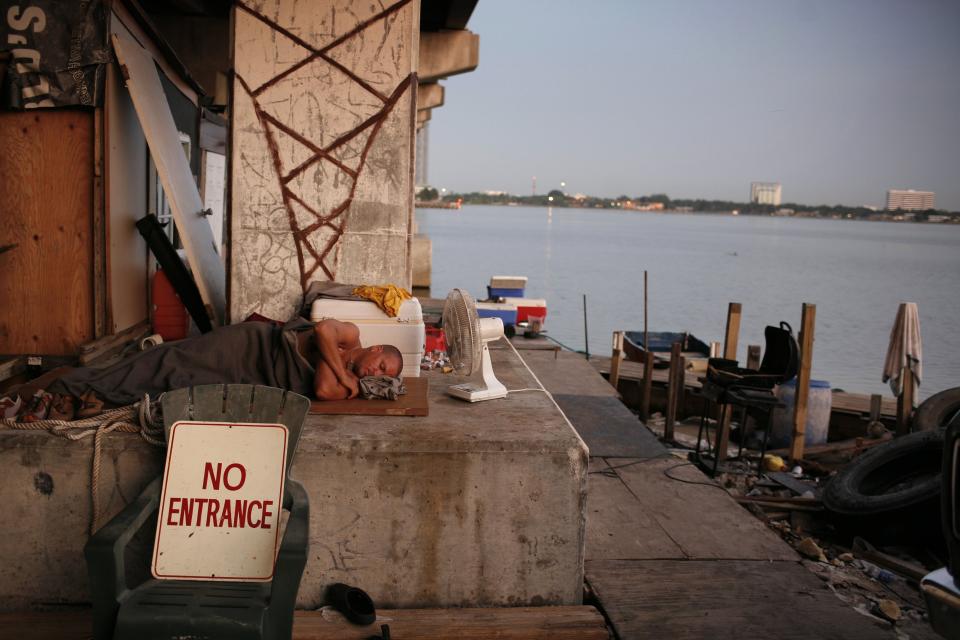 Miami's sex offender laws render large numbers of registrants homeless. Starting in the mid-2000s, a group of 75 sex offenders began living in a tent encampment under a bridge. Since then, it has grown to more than 300 people.&nbsp; (Photo: Charles Ommanney via Getty Images)