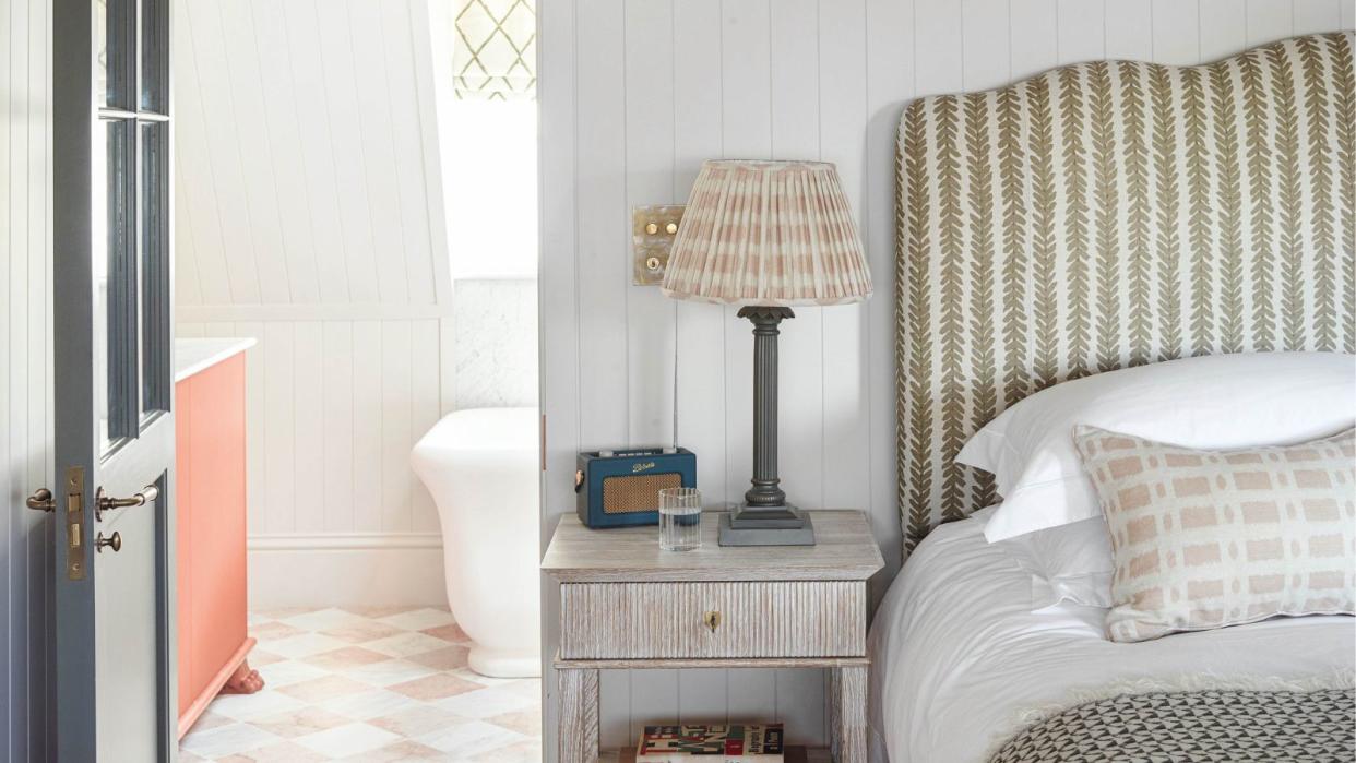  Grey bedroom with striped headboard 