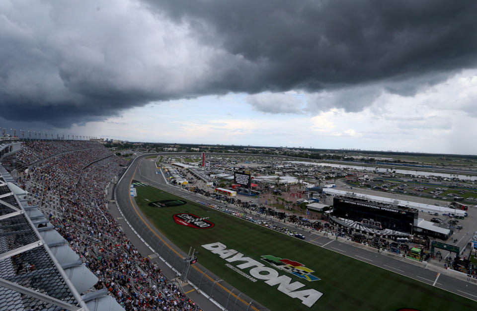 DAYTONA BEACH, FLORIDA - JULY 07: Storm clouds and weather brings the cars to pit road during the Monster Energy NASCAR Cup Series Coke Zero Sugar 400 at Daytona International Speedway on July 07, 2019 in Daytona Beach, Florida. (Photo by Brian Lawdermilk/Getty Images)