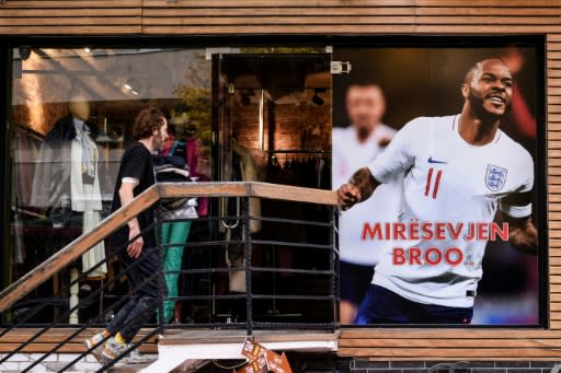 a clothing store in Pristina put up a giant banner with a picture of Raheem Sterling, the Manchester City star, with an inscription "Miresevjen broo (Welcome bro)"