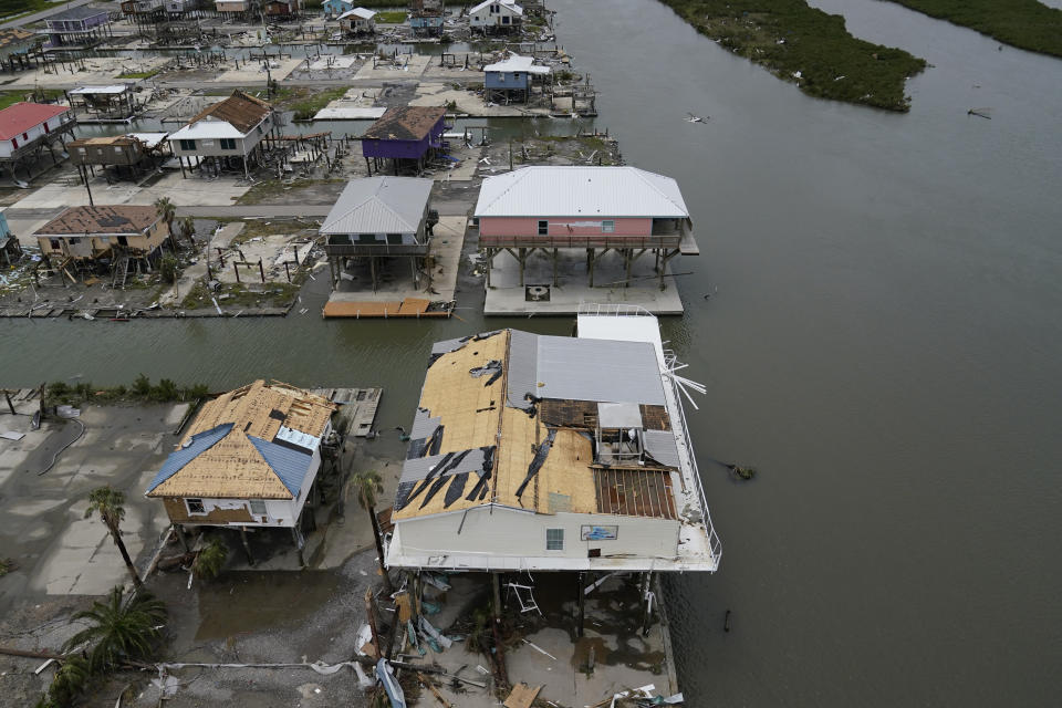 The remains of homes are seen in the aftermath of Hurricane Ida in Grand Isle, La., Tuesday, Aug. 31, 2021. (AP Photo/Gerald Herbert)