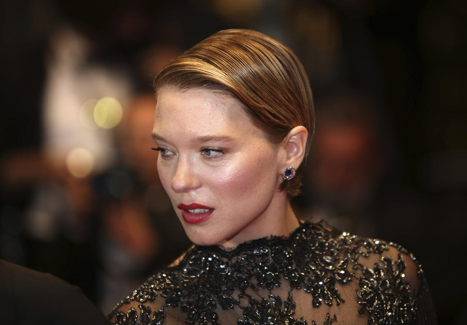 Lea Seydoux poses for photographers upon arrival at the premiere of the film 'Crimes of the Future' at the 75th international film festival, Cannes, southern France, Monday, May 23, 2022. (Photo by Vianney Le Caer/Invision/AP)