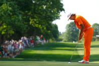 CHARLOTTE, NC - MAY 06: Rickie Fowler of the United States putts on the 16th hole during the final round of the Wells Fargo Championship at the Quail Hollow Club on May 6, 2012 in Charlotte, North Carolina. (Photo by Mike Ehrmann/Getty Images)