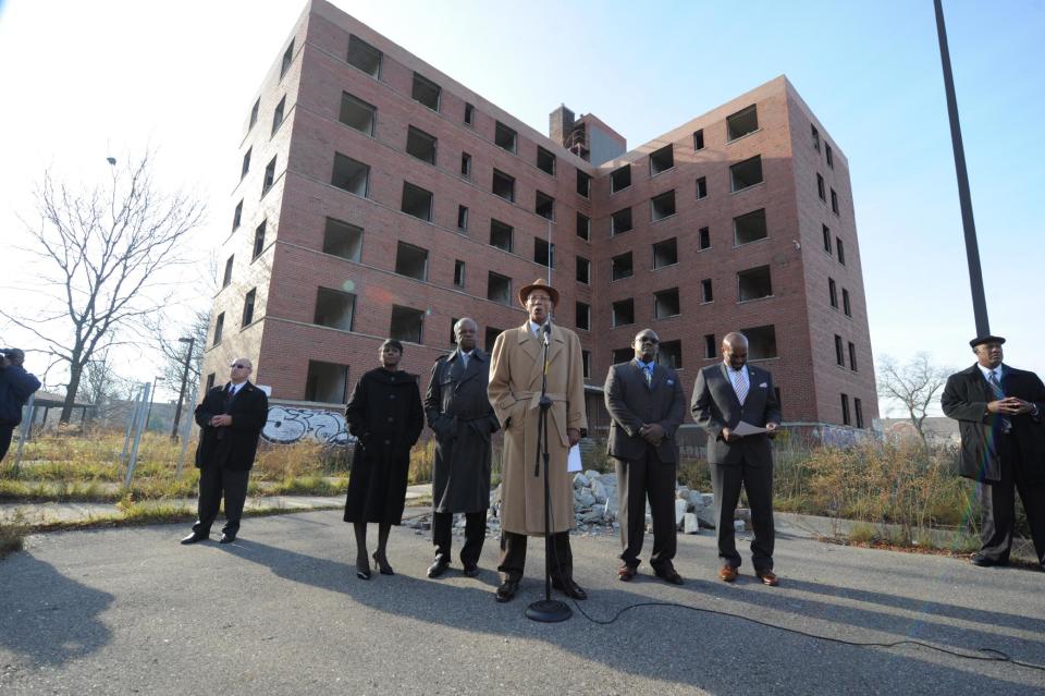 Detroit Mayor Dave Bing announces the demolition of the Frederick Douglass Homes housing project on Thursday, Nov. 15, 2012 in Detroit. Bing says police and firefighters frequently respond to reports of crime and arson in the complex, and that demolishing it will allow scant city emergency resources to be deployed elsewhere. He said that the yearlong demolition and cleanup will be paid for by a $6.5 million federal Housing and Urban Development grant. The city has no set plans for redevelopment of the complex known as the Brewster projects, where a young Diana Ross and the Supremes spent some of their pre-Motown years. Past proposals have included a mix of new homes and retail establishments. (AP Photo/Detroit News, Max Ortiz) DETROIT FREE PRESS OUT; HUFFINGTON POST OUT