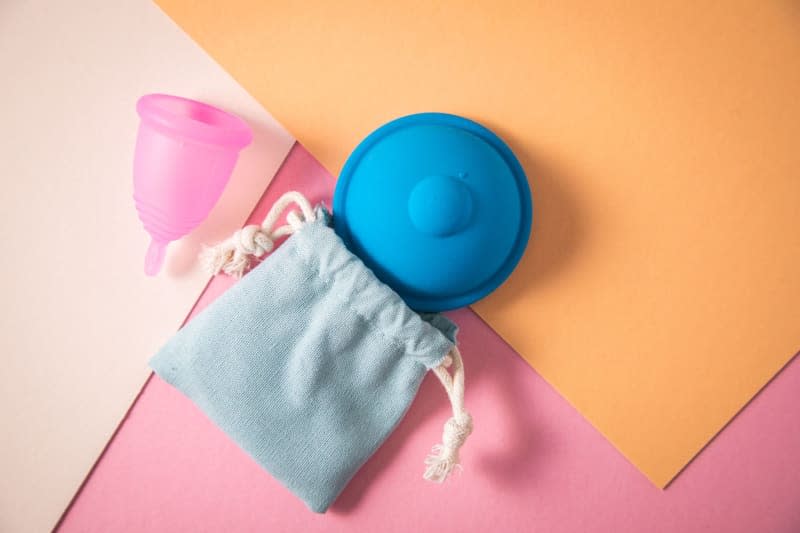 A menstrual cup collects blood and can later be rinsed out in the washbasin. Christin Klose/dpa