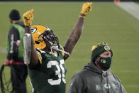 Green Bay Packers' Jamaal Williams celebrates after an NFL divisional playoff football game against the Los Angeles Rams Saturday, Jan. 16, 2021, in Green Bay, Wis. The Packers defeated the Rams 32-18 to advance to the NFC championship game. (AP Photo/Morry Gash)