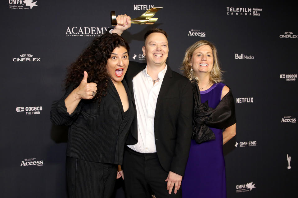 TORONTO, ONTARIO - MAY 31: (L-R) Michelle Mama, Trevor Boris and Laura Michalchyshyn pose with the Best Reality/Competition Program or Series Award during the 2024 Canadian Screen Awards at CBC Broadcast Centre on May 31, 2024 in Toronto, Ontario.  (Photo by Jeremy Chan/Getty Images)