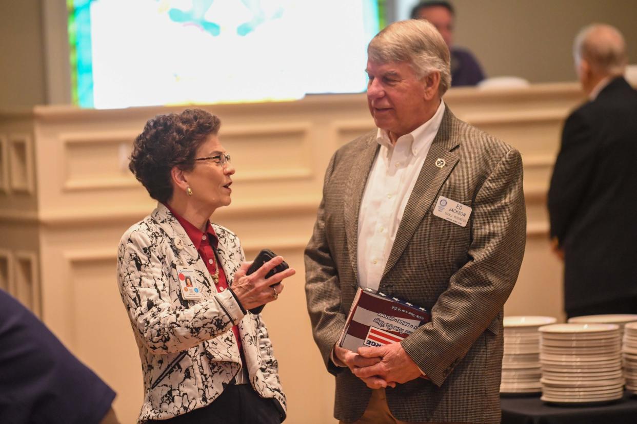 West Tennessee Healthcare Director Dr. Vicki Lake and State Senator Ed Jackson converse before the first Jackson Rotary Club meeting of the year in Jackson, Tenn., on Wednesday, Jan. 3, 2024.