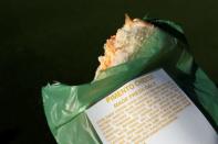 A pimento cheese sandwich is seen in its green plastic wrapper at Augusta National Golf Club in Augusta, Georgia, U.S. April 4, 2017. REUTERS/Jonathan Ernst