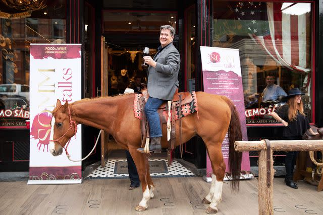 <p>Luis Zepeda</p> Ray Isle on horseback in front of Kemo Sabe, a western-wear shop in Aspen