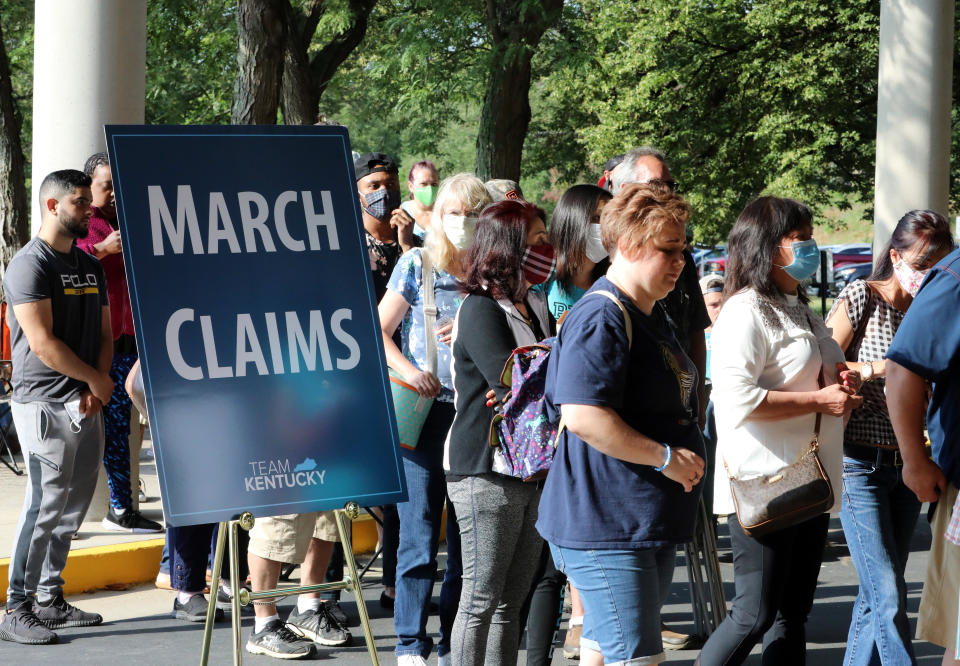 FRANKFORT, KY - JUNE 19: Hundreds of unemployed Kentucky residents wait in long lines outside the Kentucky Career Center for help with their unemployment claims on June 19, 2020 in Frankfort, Kentucky. (Photo by John Sommers II/Getty Images)