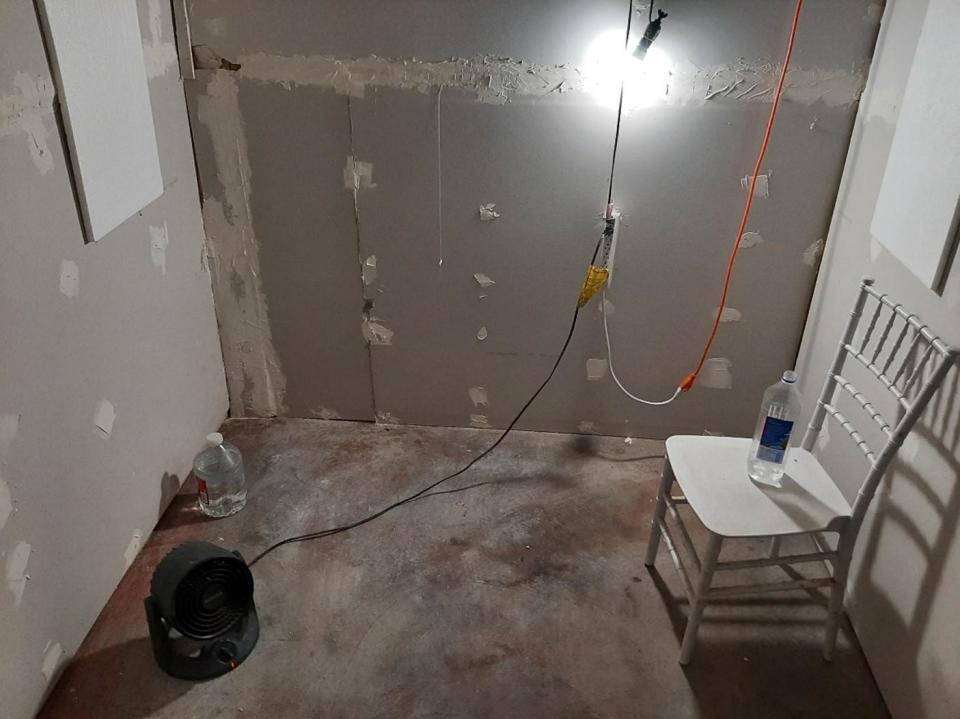 An interior shot of a makeshift cinderblock cell that an alleged sexual assault victim escaped from in Oregon.  / Credit: FBI