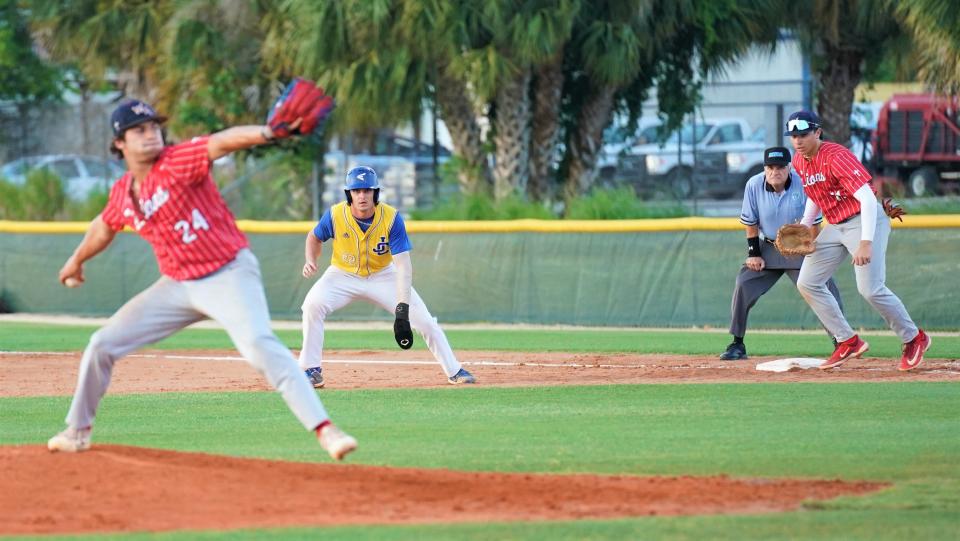 John Carroll Catholic's Jake Rychter takes his lead off first base during the Region 4-2A semifinal against Westminster Academy on Friday, May 12, 2023 in Fort Pierce. The Lions won 10-0 in five innings.